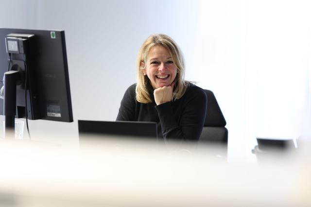 Team members collaborating on project